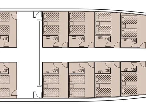 A top-down deck plan diagram of a boat showing multiple cabin layouts with beds and bathrooms arranged along a central corridor.