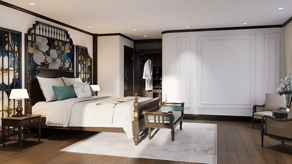 A luxury cabin interior with a double bed, decorative wall panels, wooden furniture, and white paneled walls.